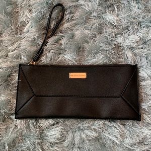 New York & Company Leather Wristlet Bag with gold hardware.